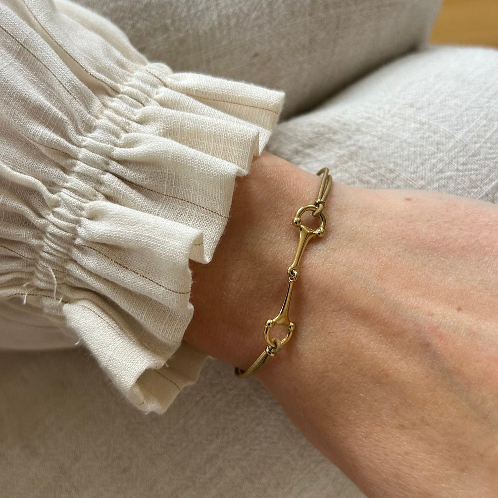 Equestrian Jewelry armband Lana: dun elastisch koordje met een fijne bit in goud of zilver