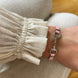 Equestrian Jewelry armband Lilo: bandje in suède-look met een bit in goud of zilver