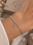 Equestrian Jewelry armband Dallas met hoefijzerhanger en een rij zirkonia, in zilver en goud