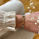 Equestrian Jewelry armband Lilo: bandje in suède-look met een bit in goud of zilver