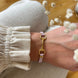 Equestrian Jewelry armband Lilo: bandje in suède-look met een bit in goud of zilver