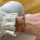 Equestrian Jewelry armband Lilo: bandje in suède-look met een bit in goud of zilver