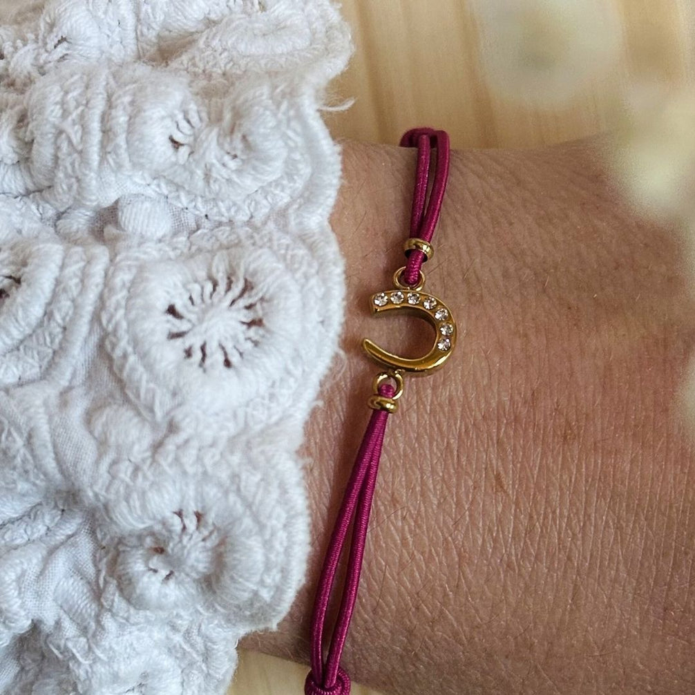 Equestrian Jewelry armband Lola: klein hoefijzer met strass-steentjes op een gekleurd koordje, in goud of zilver