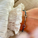 Equestrian Jewelry armband Lana: dun elastisch koordje met een fijne bit in goud of zilver