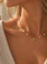 Equestrian Jewelry ketting Rio met hoefijzerhanger met strass, klavertjes en natuursteentjes, in zilver en goud