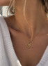 Equestrian Jewelry ketting Roxie met ronde hanger en hoefijzermotief, in zilver en goud