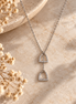 Equestrian Jewelry Y-ketting Cliff met twee stijgbeugels met strass-steentjes, in zilver en goud