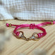 Equestrian Jewelry armband Sam: satijnen koord met een bit bezet met strass-steentjes, in goud of zilver