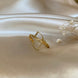 Equestrian Jewelry ring Stella in de vorm van een stijgbeugel rond de vinger, in zilver en goud