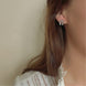 Equestrian Jewelry oorbellen Lady: hoefijzer-oorknopjes volledig bezet met strass-steentjes, in zilver of goud