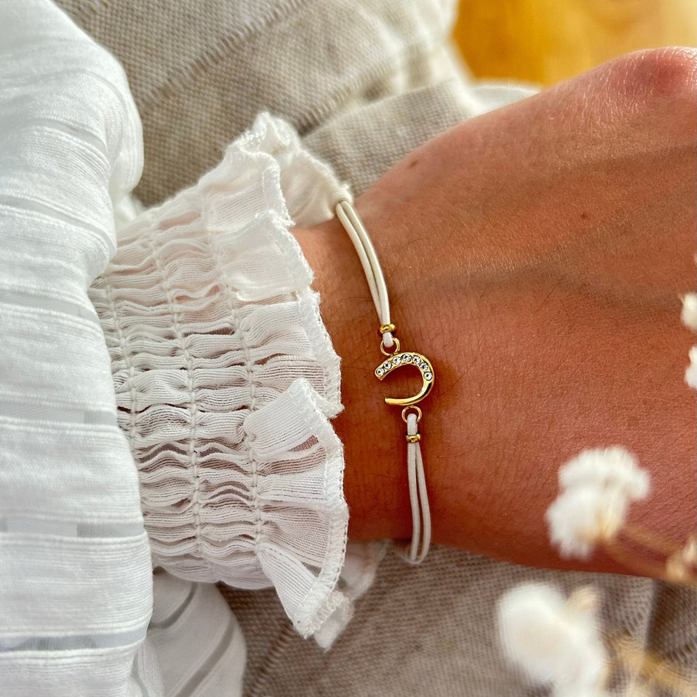 Equestrian Jewelry armband Lola: klein hoefijzer met strass-steentjes op een gekleurd koordje, in goud of zilver