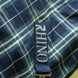 Rhino-logo op de borstband van de Rhino Plus Turnout deken